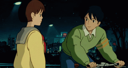 Man and Girl Looking at Each Other in Front of Sign Saying A