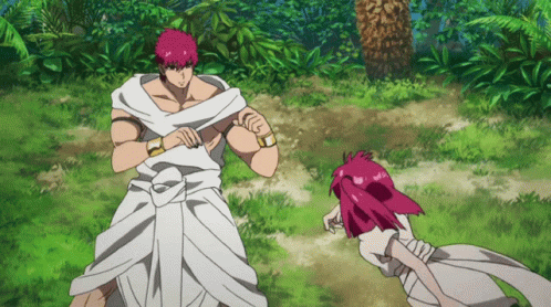 Man And Girl With Pink Hair Standing In Field GIF
