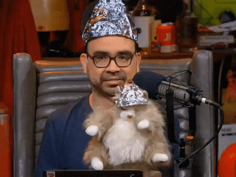 Man And His Puppet Wearing Tin Hat GIF