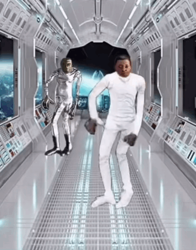 Man and Robot Dancing in Space Hallway