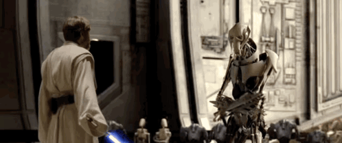 Man And Robot With Lightsaber GIF