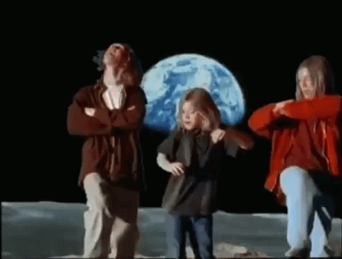 Man And Two Girls Dancing On Moon In Front Of Blue Planet GIF