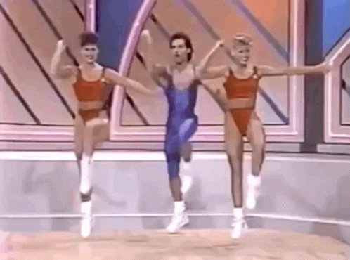 Man And Two Women Aerobics Stage GIF