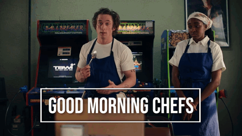 Man and Woman at Arcade Machine Good Morning Chefs