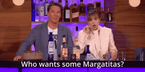 Man and Woman at Bar with Margaritas