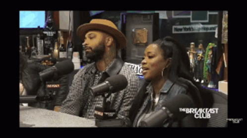 Man and Woman at Microphones Breakfast Club