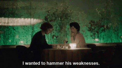 Man And Woman At Table With I Wanted To Hammer His Weaknesses GIF