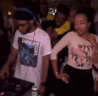 Man and Woman Dancing at Party