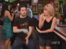 Man and Woman Dancing in Bar