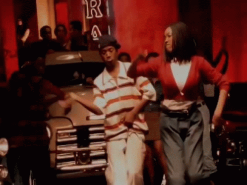 Man and Woman Dancing in Club