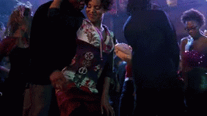 Man And Woman Dancing In Crowded Nightclub GIF