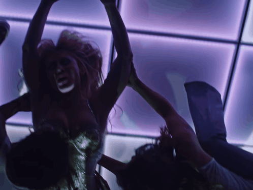 Man and Woman Dancing in Dark Room