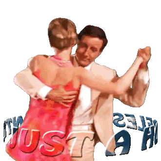 Man and Woman Dancing in Front of Just