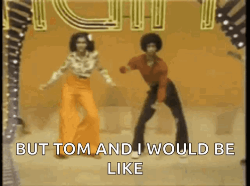 Man and Woman Dancing in Front of Sign but tom and i would be like