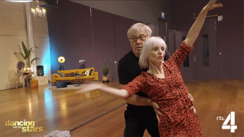 Man and Woman Dancing in Studio Dancing With the Stars