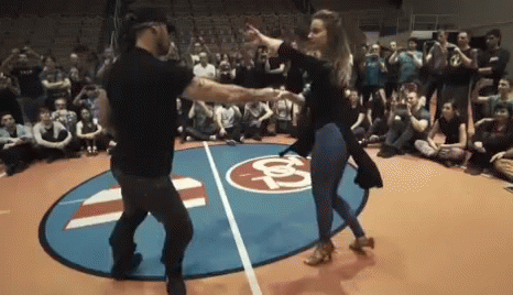 Man And Woman Dancing On Basketball Court GIF