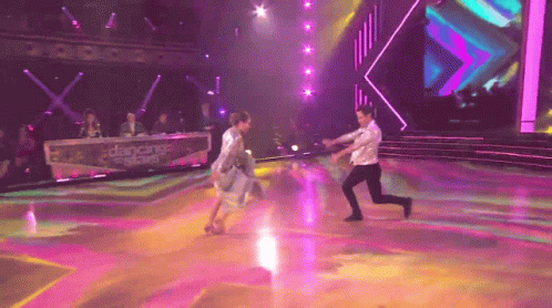 Man and Woman Dancing on Dancing with the Stars Stage