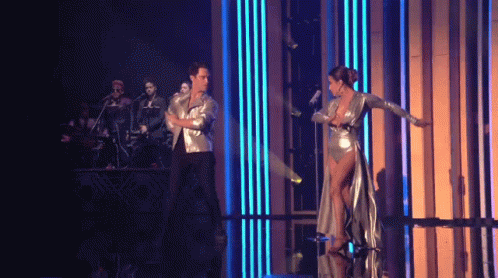 Man and Woman Dancing on Stage