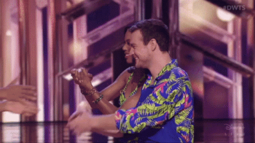 Man and Woman Dancing on Stage DWTS