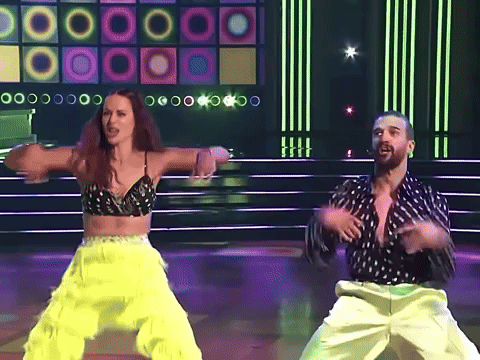 Man and Woman Dancing on Stage