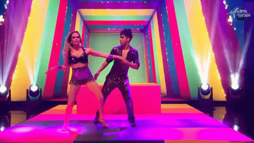 Man And Woman Dancing On Stage Saying Dancing Brasil GIF