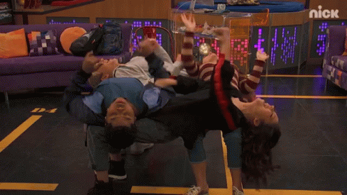 Man And Woman Doing Handstand GIF