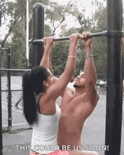 Man And Woman Doing Pull Ups GIF