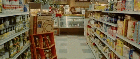 Man And Woman Doing Salsa At Grocery Store GIF