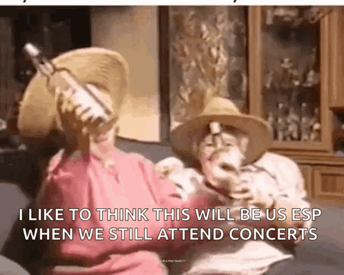 Man and Woman Drinking Wine on Couch