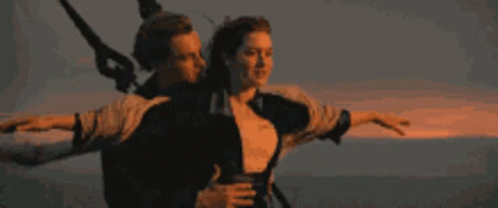 Man And Woman Flying Through Ocean Air GIF