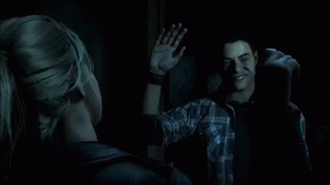 Man And Woman High Fiving In Dark Video Game GIF