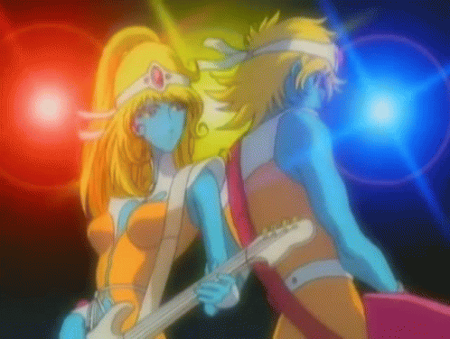 Man and Woman Holding Guitar