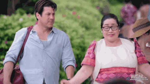 Man And Woman Holding Hands Blurry Photo GIF
