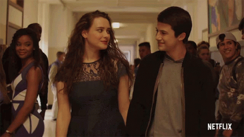 Man And Woman Holding Hands In Netflix Hallway GIF