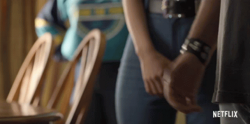 Man and Woman Holding Hands in Netflix Trailer