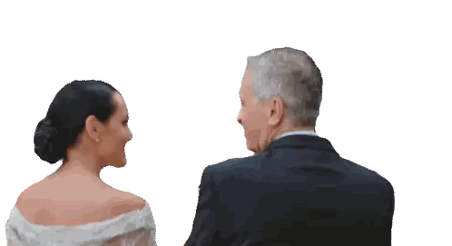Man and Woman Holding Hands Smiling