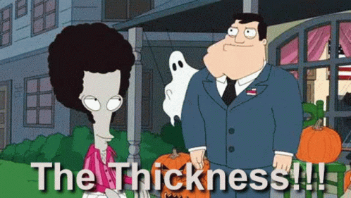 Man and Woman Holding Pumpkins and Ghost