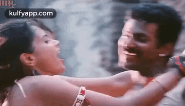 Man And Woman Hugging GIF