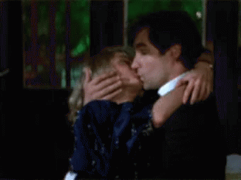 Man And Woman Hugging And Kissing GIF