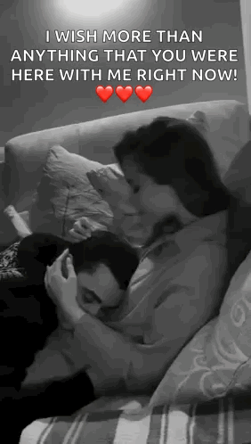 Man and Woman Hugging and Kissing on Couch
