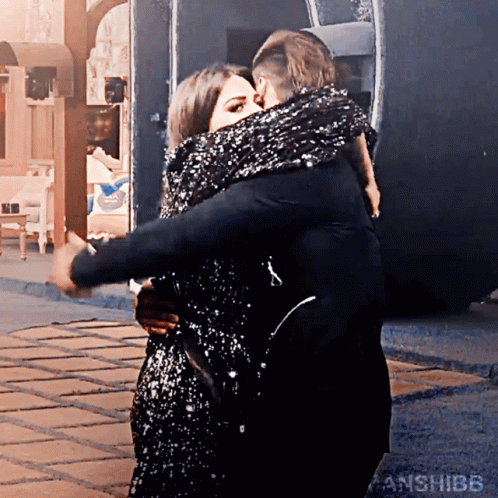 Man And Woman Hugging And Kissing GIF