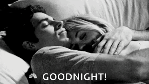 Man And Woman Hugging In Bed GIF