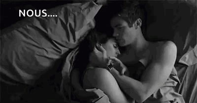 Man And Woman Hugging In Bed GIF