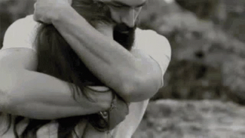 Man And Woman Hugging In Black And White GIF