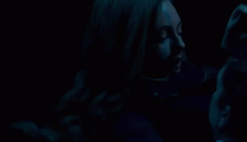 Man And Woman Hugging In The Dark GIF