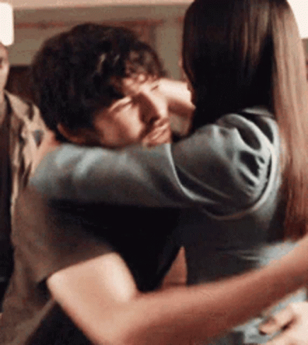 Man And Woman Hugging GIF