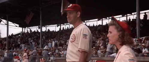 Man and Woman in Baseball Stadium