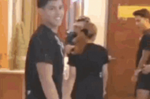 Man And Woman In Black Shirts GIF
