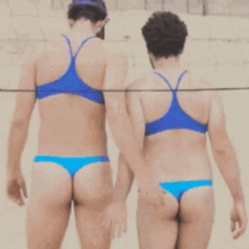Man And Woman In Blue Bikinis Holding Hands GIF