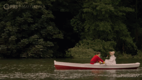 Man And Woman In Boat On Lake Sponsored By PBS And Masterpiece GIF